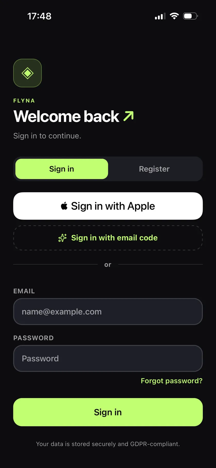 Flyna sign-in screen with Sign in with Apple, email-code login and classic email sign-in